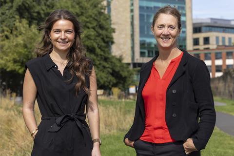 Katharine Ronn and Alex Craig standing outside