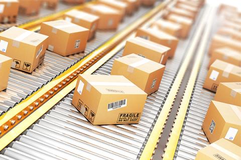 3 rows of cardboard boxes with 'fragile' on a production line